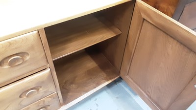 Lot 1065 - Good quality Blonde Ercol Windsor 455 sideboard with three central drawers flanked by cupboards, 154.5cm wide, 43cm deep, 68cm high