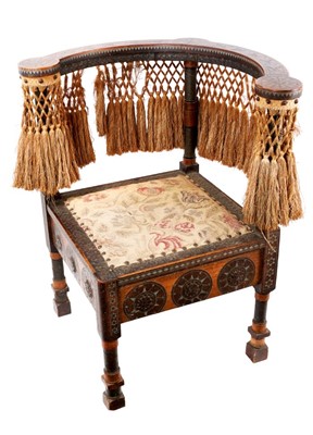 Lot 1422 - Carlo Bugatti (1856-1940), Rare walnut  and mixed metal inlaid corner chair