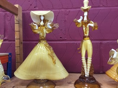 Lot 630 - Eight Murano glass amber coloured  figures