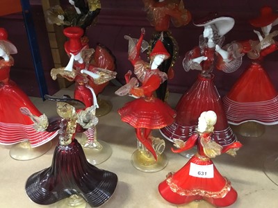 Lot 631 - Fourteen Murano red glass figures 19-37 cm