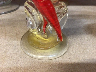 Lot 631 - Fourteen Murano red glass figures 19-37 cm