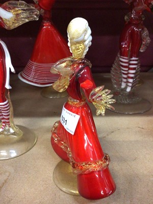 Lot 631 - Fourteen Murano red glass figures 19-37 cm