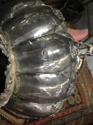 Lot 293 - A Victorian silver tea and coffee service and sugar tongs
