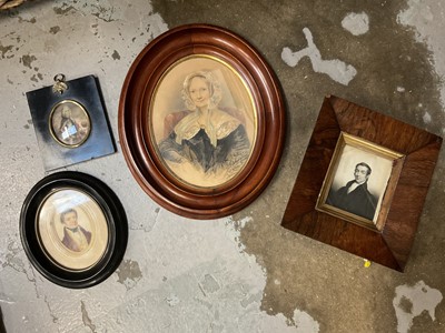 Lot 165 - Two 19th century oval watercolour portraits on paper, a printed miniature and an overpainted 17th century style miniature