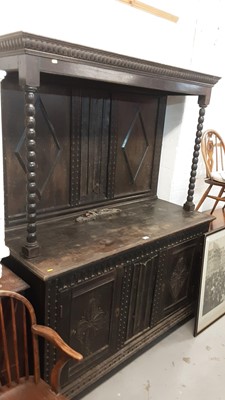 Lot 1097 - Late Victorian carved oak two height sideboard with panelled back flanked by bobbin turned supports, two carved panelled doors below, 152cm wide, 61cm deep, 188cm high