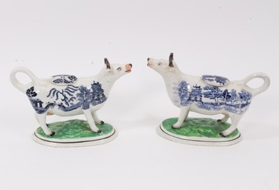 Lot 6 - A pair of 19th century Staffordshire pottery Willow pattern cow creamers