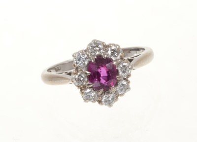 Lot 431 - Ruby and diamond cluster ring