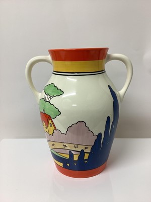 Lot 10 - Wedgwood limited edition two handled Lotus jug decorated in the Orange Roof Cottage pattern, based upon an original by Clarice Cliff, no. 13 of 250, 31cm high, boxed with certificate