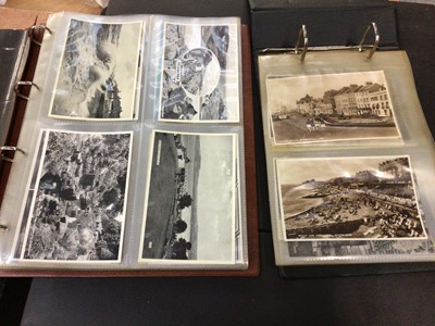 Lot 89 - Two albums of postcards, all GB topographical and comic, approximately 110