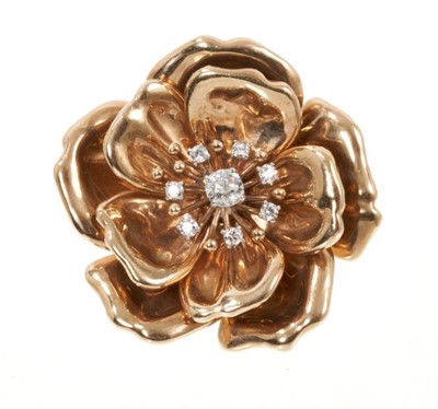 Lot 404 - Cartier gold and diamond flower head brooch