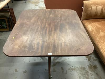 Lot 1001 - Nineteenth century mahogany tilt top table on turned column and three splayed legs with brass capped castors, 116cm x 99cm