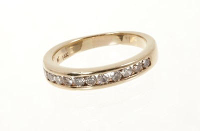 Lot 442 - Diamond eternity ring with brilliant cut diamonds in 14ct yellow gold channel setting