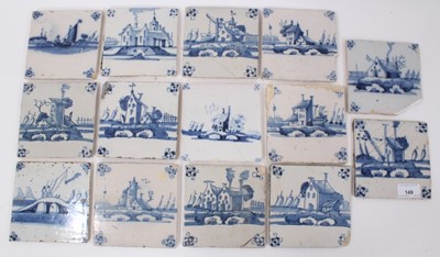 Lot 149 - Collection of fourteen 18th century Delft blue and white tiles, decorated with buildings and Dutch scenes (14)