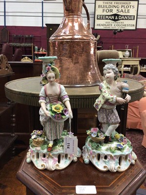 Lot 142 - Pair of Meissen style candlesticks