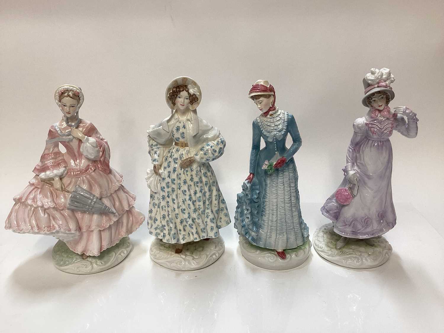 Lot 1125 - Four Royal Worcester limited edition figures