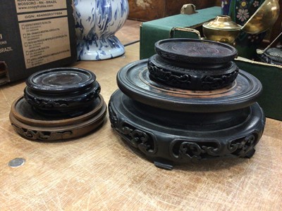 Lot 86 - Four Chinese carved wood stands