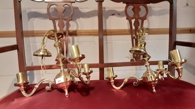 Lot 251 - Pair of brass three branch ceiling lights