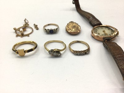 Lot 822 - Antique yellow metal ring, 18ct gold diamond set ring, one other diamond three stone ring, 9ct gold gem set ring, 9ct gold seed pearl pendant, yellow metal locket and 9ct gold cased wristwatch on l...