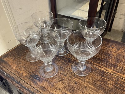 Lot 158 - A set of six large 19th century rummers, cut with a band of vertical flutes to the base of the bowl . (6)