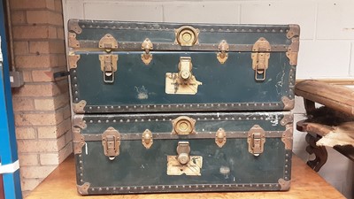 Lot 1131 - Pair of vintage metal bound trunks with leatherside handles, 90cm wide, 52cm deep, 35cm high