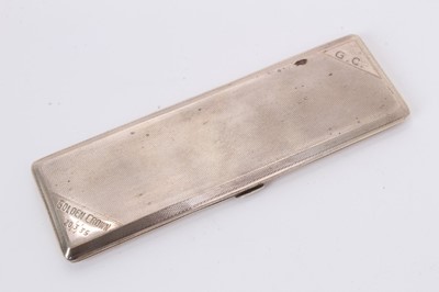 Lot 268 - 1930s silver cigarette case of narrow rectangular form, with engine turned decoration and engraved GOLDEN CROWN 20/3/35 and initials G.C. (London 1934) Padgett & Braham Ltd, all at approximately 3o...