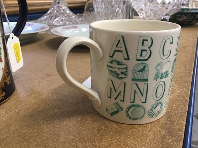 Lot 123 - Eric Ravilious for Wedgwood, an alphabet mug in green on a cream ground, 8.5cm high
