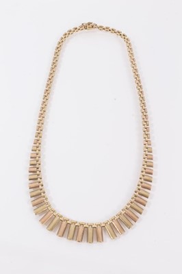 Lot 413 - 9ct gold Cleopatra style fringe necklace with graduated links. 43cm long