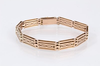 Lot 414 - Edwardian 9ct gold articulated panel bracelet