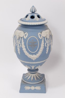 Lot 154 - A Wedgwood Jasper ware commemorative urn and cover, made for the 225th Anniversary of the Wedgwood factory in 1984, Ltd. ed. no. 42/225, 32cm high, in original box