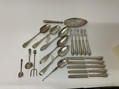 Lot 55 - Group of Georgian and later silver flatware, to include a pierced fish slice (London 1791), table spoons, toasting fork, desert cutlery and other items (various dates and makers).