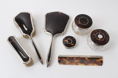 Lot 307 - 1930s seven piece silver and tortoiseshell dressing table set