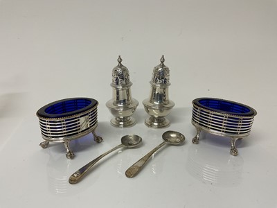 Lot 56 - Pair of Victorian silver perrerettes, (London 1893), maker Charles Stuart Harris, together with a pair of Georgian silver salt spoons and a pair of 19th century Old Sheffield plate.
