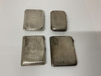 Lot 17 - George V silver cigarette case of rectangular form with engine turned decoration and gilded interior, (Birmingham 1936), maker Joseph Gloster Ltd, 8cm in overall length, together with three another...
