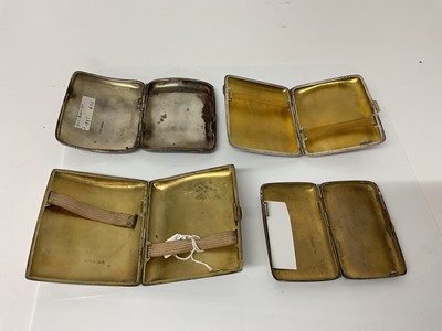 Lot 25 - Victorian silver cigarette case of rectangular form with engraved decoration, (Birmingham 1886), maker William Harrison Walter, 8.8cm in overall length, together with three another similar silver c...