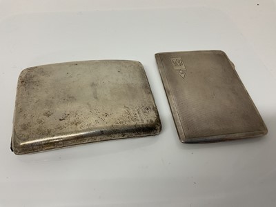 Lot 28 - George V silver cigarette case of curved rectangular form, (Birmingham 1919), maker William Henry Sparrow, 12cm in overall length, together with another silver cigarette case (Birmingham 1936), all...