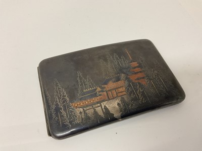Lot 38 - Early 20th century Japanese silver Damascene cigarette case of rectangular form with pagoda decoration, stamped Sterling to interior, with character marks to reverse, 12cm in overall length, all at...