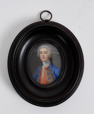 Lot 826 - English School, circa 1740, miniature watercolour portrait on ivory, depicting a military gentleman wearing blue coat with gold braid, apparently unsigned, 4.5 x 3.7cm, in glazed ebonised wooden fr...