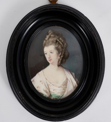 Lot 825 - Samuel Cotes (1734-1818) watercolour portrait miniature on ivory, portrait of a lady wearing pearls and cream dress with gold flowers, signed with initials and dated 1776, oval, 8.5 x 7cm, glazed e...