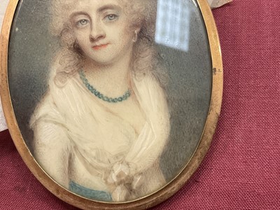 Lot 814 - Ann Mee (1770/75-1851) watercolour miniature portrait on ivory, Hon. Louisa Verney (1769-1835), apparently unsigned, oval, 7 x 5.1cm, glazed gilt frame with woven hair to rear, housed in rectangula...