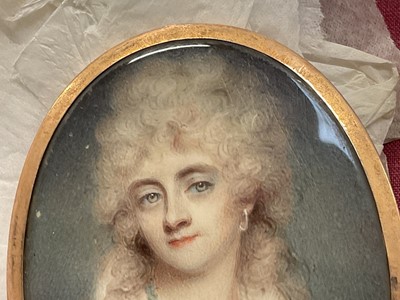Lot 814 - Ann Mee (1770/75-1851) watercolour miniature portrait on ivory, Hon. Louisa Verney (1769-1835), apparently unsigned, oval, 7 x 5.1cm, glazed gilt frame with woven hair to rear, housed in rectangula...