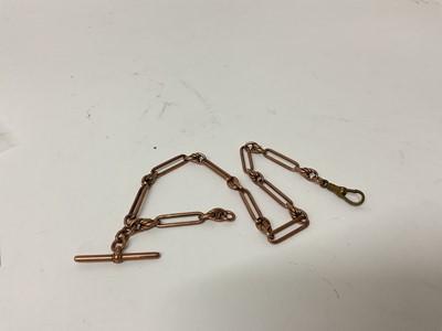Lot 71 - Edwardian 9ct rose gold fancy link watch chain with associated brass clip. 30.3