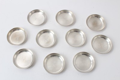 Lot 255 - Ten Continental Art Deco engine turned dishes