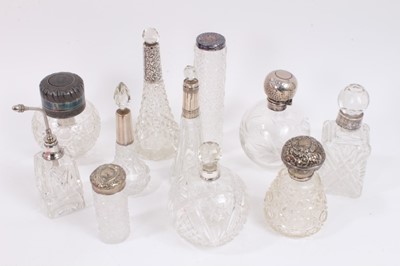 Lot 846 - Group of silver mounted cut glass scent bottles