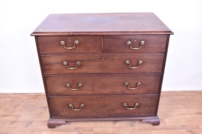Lot 1322 - Early George III mahogany chest of drawers, raised on cut down ogee feet