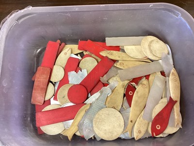 Lot 68 - Collection of bone and mother of pearl gaming counters including fish