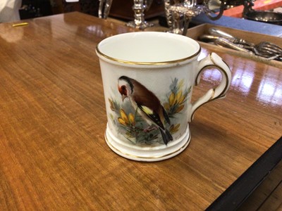 Lot 129 - A Royal Worcester cup painted with a goldfinch by W. Powell