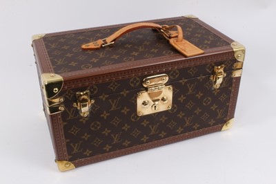 Lot 2089 - Louis Vuitton vanity case with fitted interior, signature monogrammed and brass fittings, together with a Louis Vuitton purse and Louis Vuitton key fob with two keys, label numbered 1029952, lock a...
