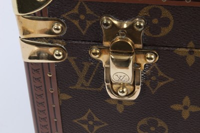 Lot 2089 - Louis Vuitton vanity case with fitted interior, signature monogrammed and brass fittings, together with a Louis Vuitton purse and Louis Vuitton key fob with two keys, label numbered 1029952, lock a...