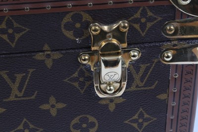 Lot 2089 - Louis Vuitton vanity case with fitted interior, signature monogrammed and brass fittings, together with a Louis Vuitton purse and Louis Vuitton key fob with two keys, label numbered 1029952, lock a...