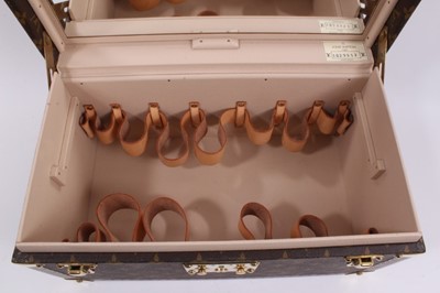 Lot 2089 - Louis Vuitton vanity case with fitted interior, signature monogrammed and brass fittings, together with a Louis Vuitton purse and Louis Vuitton key fob with two keys, label numbered 1029952, lock a...